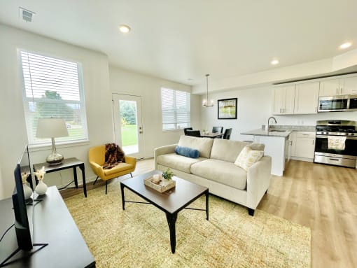 Living room in townhome at Elmwood Lake Apartments in Hudsonville MI