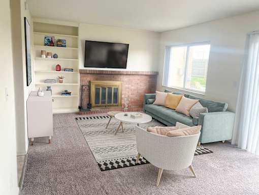 Spacious living room in East Lansing Apartments near Michigan State University | Holiday Townhomes