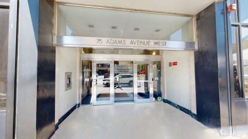 the entrance to the 79 adams avenue west building