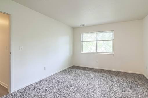 Bedroom at Muskegon Apartments | Lake Forest Apartments in Muskegon, MI