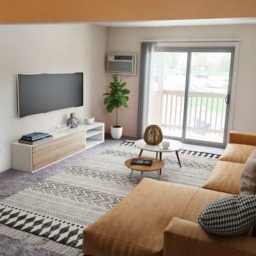Spacious living room at Mason Hills Apartments in Mason, MI