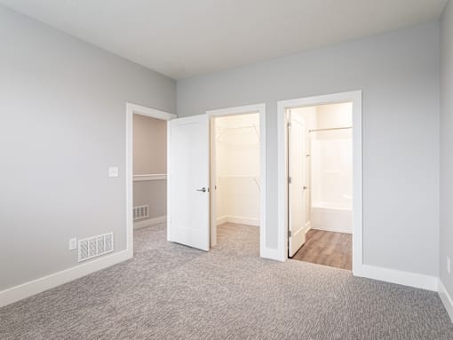 Bedroom at apartments in Haslett, Michigan | Newton Place Apartments in Haslett MI