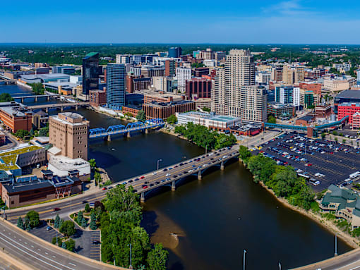 A cityscape with a river running through it.
