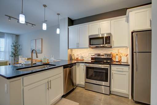 Modern kitchen at Vista at the Heights Apartments in Lansing, MI