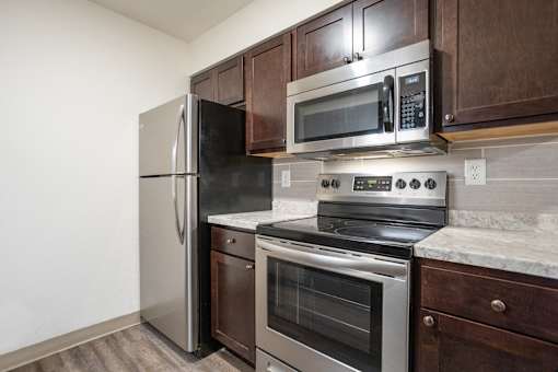 Kitchen at Whispering Pines Apartments in Holland, Michigan