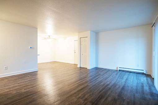 Living room at Whispering Pines Apartments in Holland, Michigan