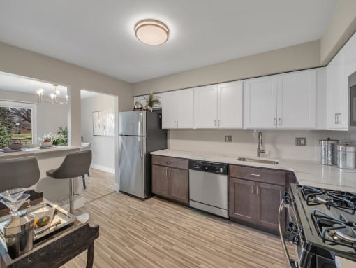 Well Equipped Kitchen at Rochester Club Apartments - Rochester, MI, Michigan