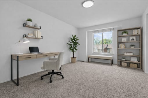 A room with a desk, chair, and shelves with plants and books.