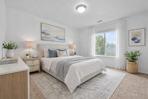 A bedroom with a large bed, a nightstand, and a window with curtains.