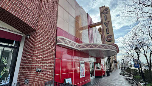 Historic downtown civic theater with vintage marquee at Village Club of Farmington Hills Apartments, Farmington Hills, MI