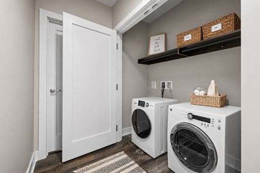 A laundry room with a washer and dryer.