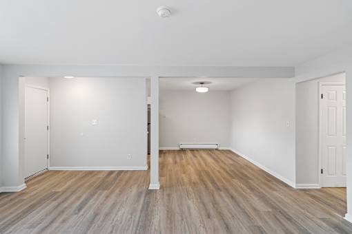 A room with wooden floors and white walls at The Park on 13 Apartments - Royal Oak, MI Apartments, Michigan