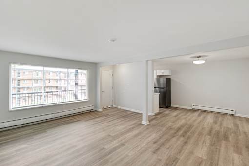 A room with a window and a door at The Park on 13 Apartments - Royal Oak, MI Apartments, Royal Oak, Michigan