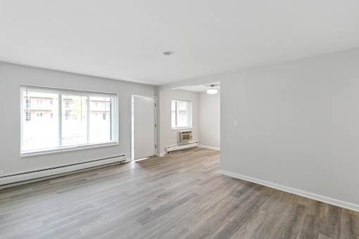 A room with a window and a door. at The Park on 13 Apartments - Royal Oak, MI Apartments, Royal Oak, Michigan