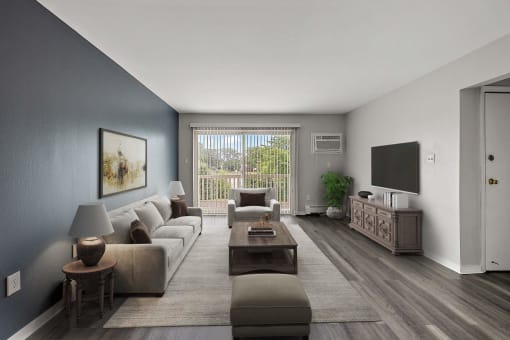a living room with a couch and a coffee table and a television