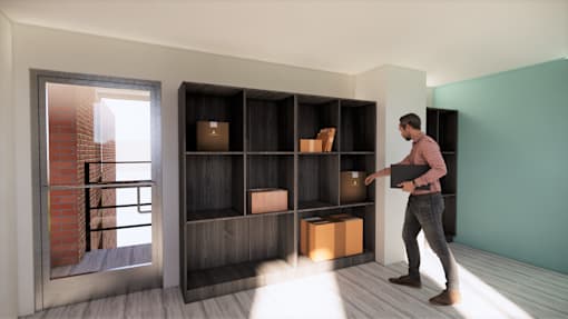 A man is carrying a box into a room with a large shelf. at The Park on 13 Apartments - Royal Oak, MI Apartments, Michigan, 48073