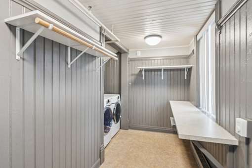 A laundry room with a washer and dryer.
