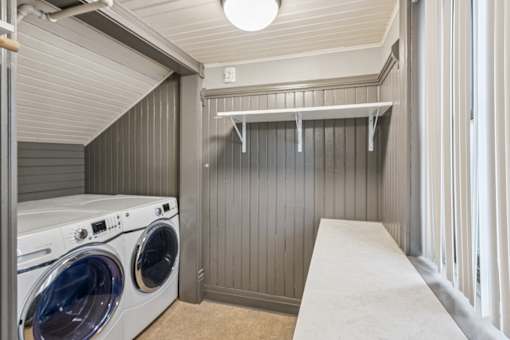 A laundry room with a washer and dryer.
