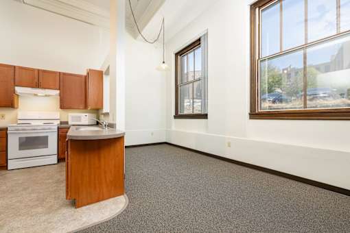 A kitchen with a window and a sink.