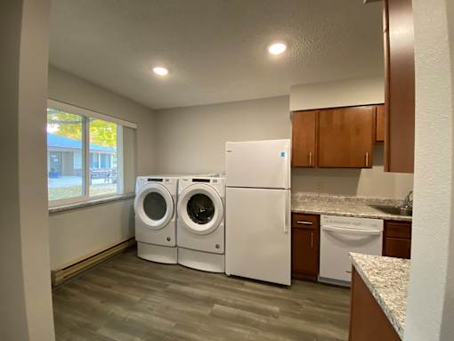 A laundry room with a washer and dryer.