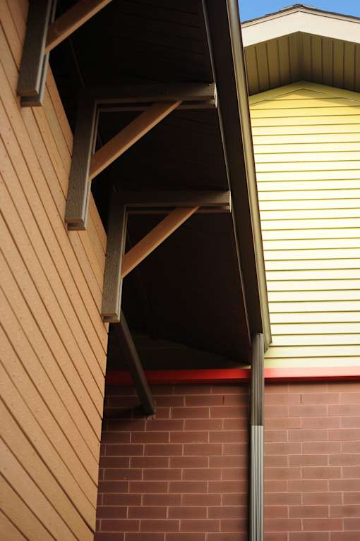 A wooden beam on a house.