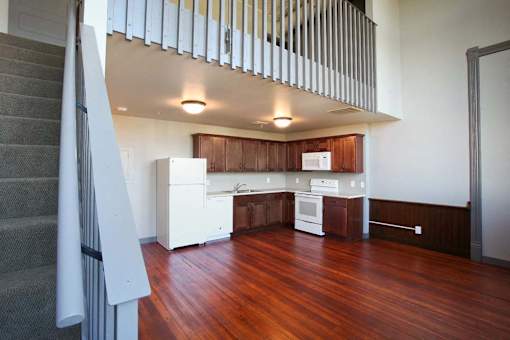 The high ceiliings in Roosevelt School's second floor allow some apartments to feature a bedroom loft above the kitchen.