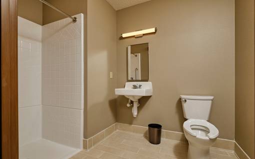 a bathroom with a toilet sink and bathtub