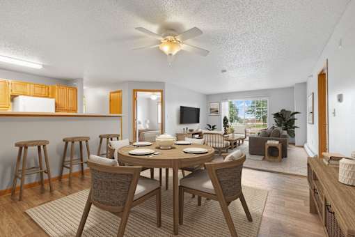 Kitchen, dining, and living room at The Preserve at Commerce, Rogers, MN, 55374
