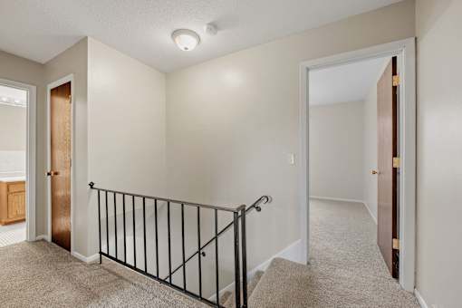Upstairs hallway of the Townhome at Beach South at the Lake in Robbinsdale, MN