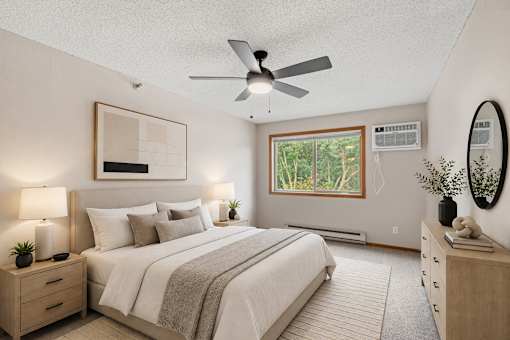 Bedroom in a newly renovated apartment home at Park Pointe Apartments in St. Louis Park, MN 55426