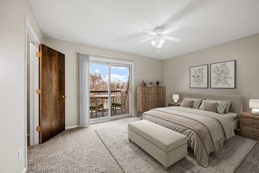 Primary bedroom of the Townhome at Beach South at the Lake in Robbinsdale, MN
