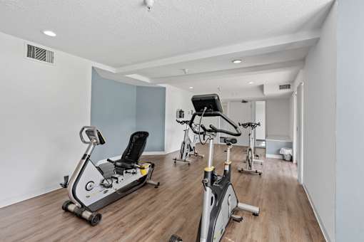 Fitness center with weight lifting equipment and cardio equipment at Cityscape, St Louis Park, MN, 55416