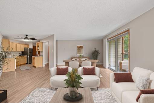 Kitchen, living room, and dining room in a newly renovated apartment home at Park Pointe Apartments in St. Louis Park, MN 55426