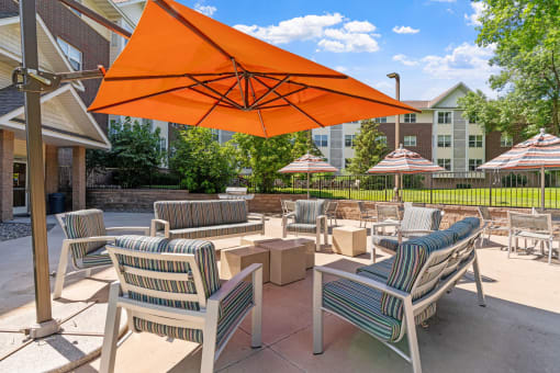 Outdoor patio tables and umbrellas
