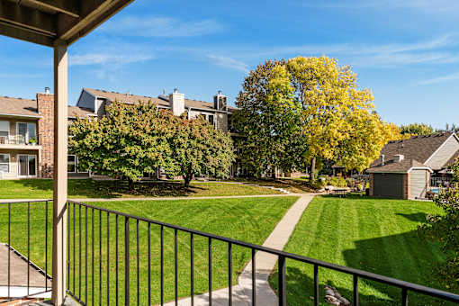 Balcony overlooking the grounds and walking paths at Eden Commons in Eden Prairie, MN 55