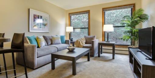 Living Room with Ample Lighting at Ridgewood Arches Apartments