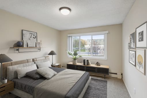an empty bedroom with a large bed and a window at Silver Lake, New Brighton, MN, 55112