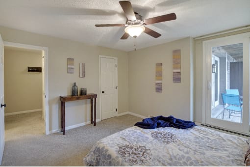 Bedroom with cozy bed at Axon Green, Minneapolis, MN