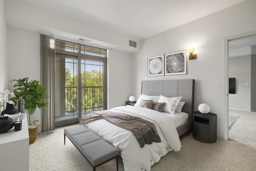 a bedroom with a bed and nightstands at The Gables at Park Pointe, St. Louis Park, 55426