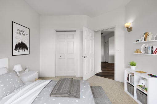 a bedroom with a bed and shelves at The Gables at Park Pointe, St. Louis Park, MN