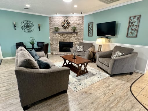 a living room with couches and a tv at Shenandoah Properties in Lafayette, IN 47905