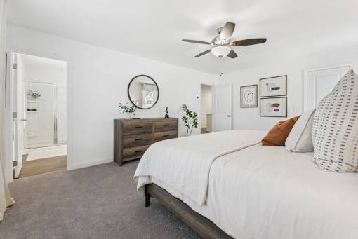 Inviting bedroom with neutral tones and stylish furnishings