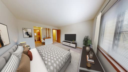 a bedroom with a bed and a large window