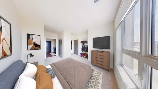 a living room with a couch and a tv