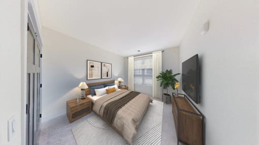 a bedroom with a bed and a tv