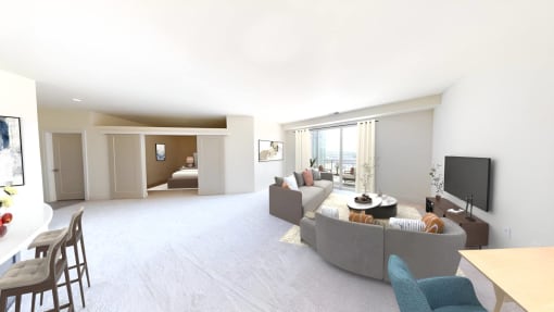 a living room with a couch and a tv