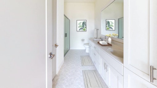 a bathroom with a sink and a toilet and a mirror