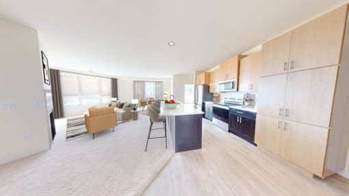 a kitchen and living room with a table and chairs