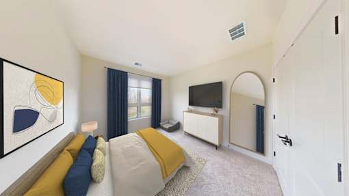 A bedroom with a bed, a couch, and a painting on the wall.