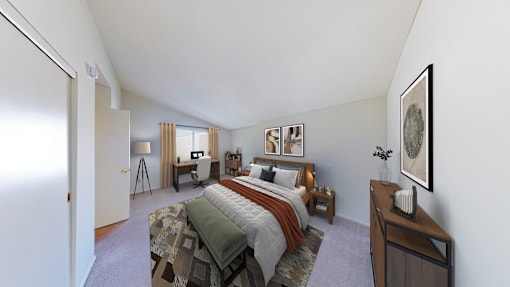 A bedroom with a bed, nightstand, and a dresser.